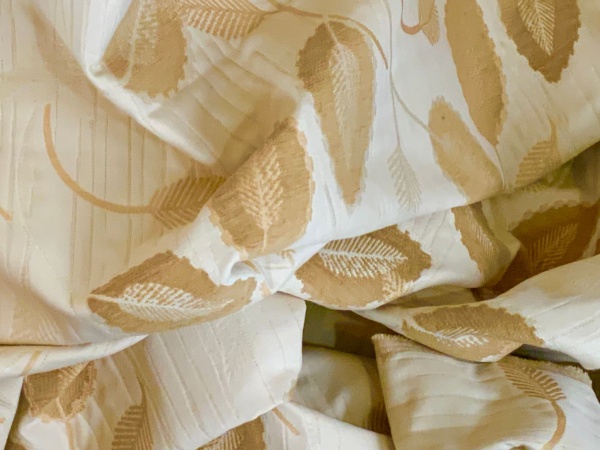 Quilted Chenille Cream Fabric in Trailing Leaves Design.  7 mts